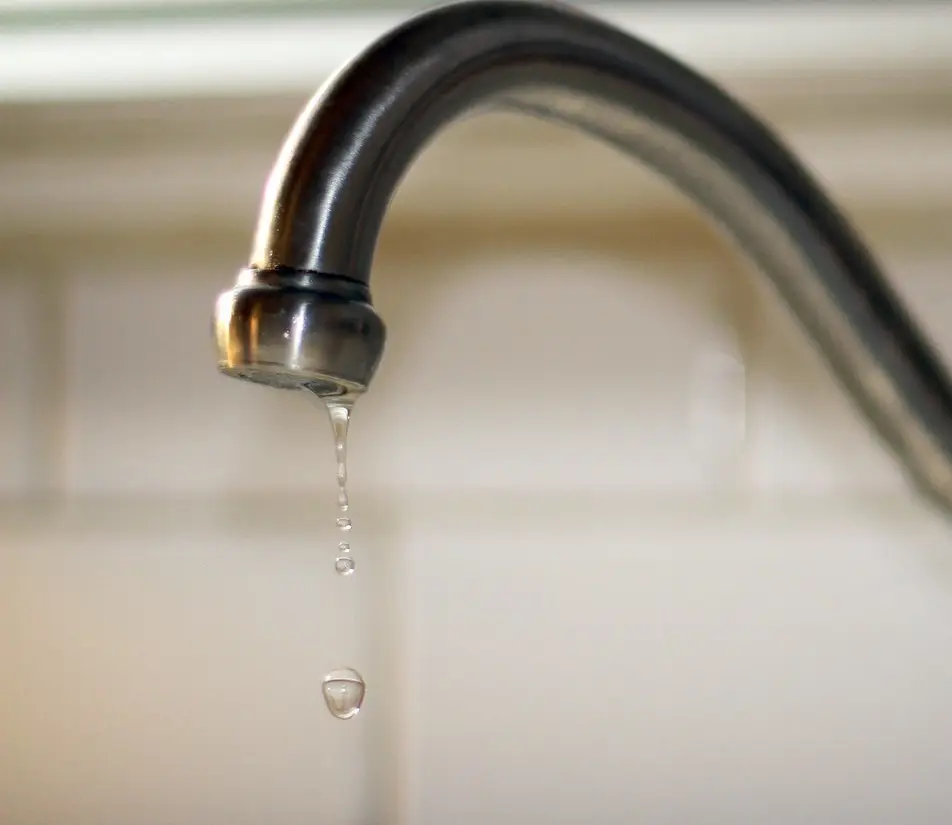 Chrome faucet with running water