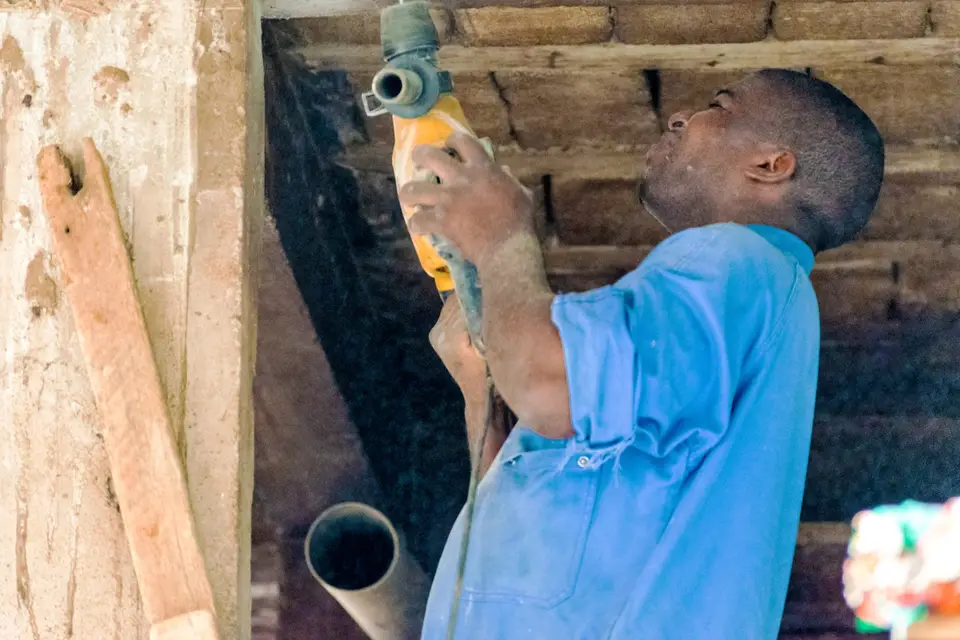 Plumber assembling and fitting water pipes